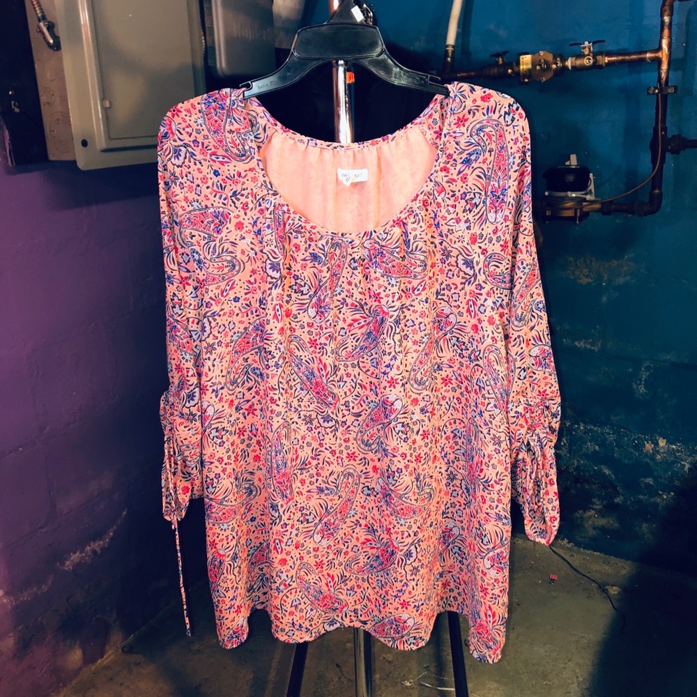 Woman’s floral scoop neck blouse